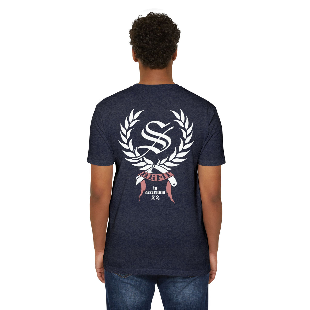 Person wearing a navy blue t-shirt with a logo on the back against a white background