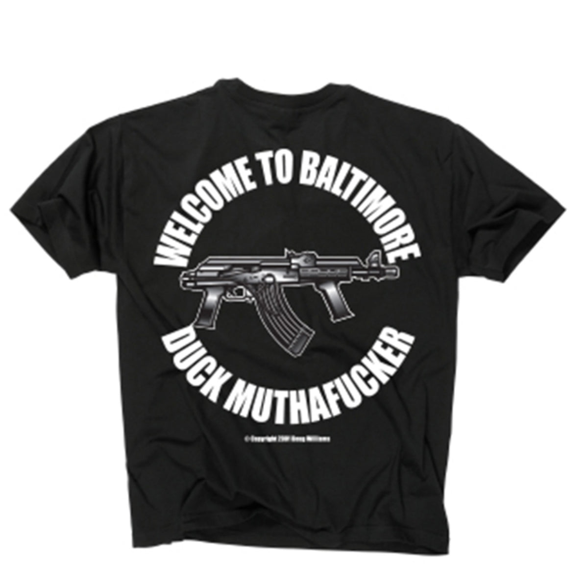 Back of black tee flat lay showing circular "Welcome to Baltimore" graphic with detailed assault rifle illustration at center, arched white bold text reading "Welcome to Baltimore / Duck Muthafucker"